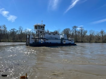 Chem Carriers’ M/V Captain Robert J. Banta push boat underway on an inland river, powered by Mitsubishi marine engines from Laborde Products.